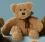 Swinging Sitting Bear Teddy Bear caramel 20 cm