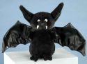 Black bat with outstretched wings